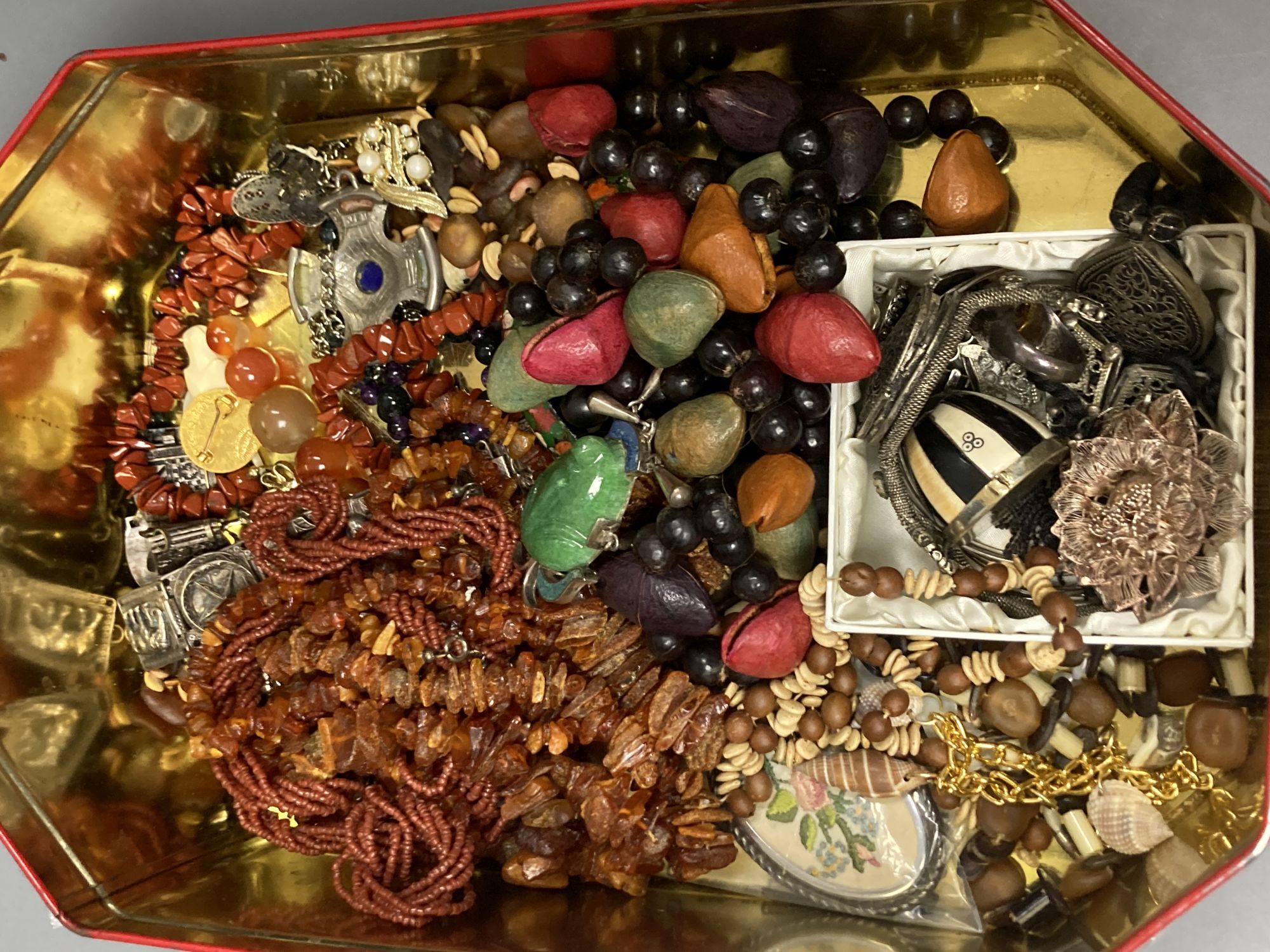 A quantity of costume jewellery etc. including a Mexican sterling and quartz set pendant brooch.